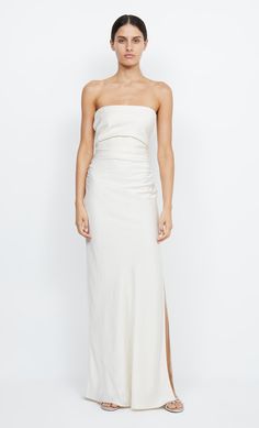 The Eternity Strapless Maxi Dress is an elegant and classic style. The dress features ruching at the cinched waist to create a flattering silhouette and falls into a bias cut maxi skirt with side split. Bec And Bridge Bridal, Strapless Pre-draped Maxi Dress For Wedding, Strapless Pre-draped Satin Maxi Dress, White Strapless Satin Maxi Dress, Strapless Satin Bias-cut Maxi Dress, Strapless Bias-cut Wedding Dress, Bec And Bridge, Bec Bridge, Australian Fashion Designers