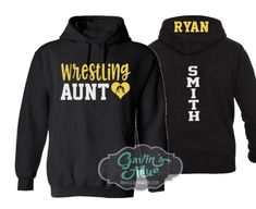 two black hoodies with yellow and white lettering on them