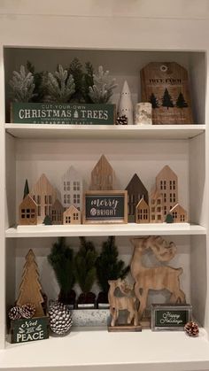 shelves with christmas decorations and other items on them