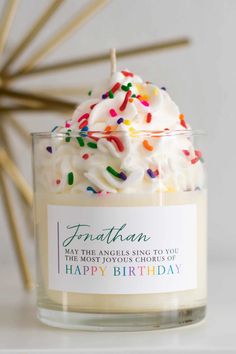 a birthday candle with sprinkles on it