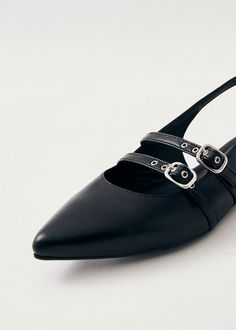 Black leather slingback flats The Wren slingback pumps are shaped from leather to a chic point-toe silhouette with straps framing the heel as well as the front of the feet. They sit on low heels featuring lightly padded insoles to maximize comfort, so you can wear them from day to night.