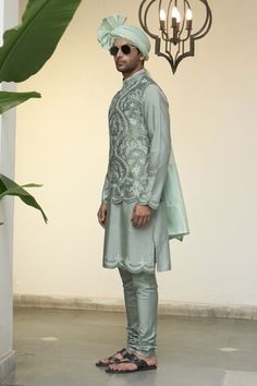 Pistachio bundi with all over floral kashmiri embroidery. Paired with an inner scallop trimmed kurta and churidar. - Aza Fashions Transitional Designer Nehru Jacket In Pista Green, Festive Green Nehru Jacket For Reception, Transitional Pista Green Nehru Jacket With Cutdana, Ceremonial Green Nehru Jacket With Chikankari Embroidery, Green Nehru Jacket With Zari Work For Reception, Pista Green Nehru Jacket With Chikankari Embroidery For Wedding, Designer Long Sleeve Nehru Jacket In Pista Green, Designer Long Sleeve Pista Green Nehru Jacket, Fitted Pista Green Bandhgala With Chikankari Embroidery