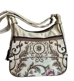 Add elegance to your style both day and night with this unique Victorian floral shoulder bag made of ivory color soft fabric. It has three zippered compartments. The interior is lined with a rose-patterned lining. Shoulder strap is adjustable. The front and back have separate patterns. If you want, you can personalize this lovely purse by adding a name tag and turn it into a meaningful birthday gift for your wife, sister, mother, best friend. It is also a perfect gift for Christmas, new year and Cream Crossbody Shoulder Bag With Zipper Pocket, Foldable Bag, Fall Gifts, Color Fabric, Christmas Gifts For Women, Personalized Christmas Gifts, Balenciaga City Bag, Victorian Style, Ivory Color