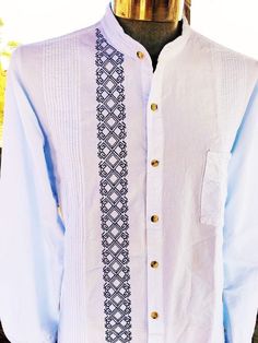 GUAYABERA 100% COTTON MANTA PRE-WASH WHITE color, with blue geometric embroidery This GUAYABERA is a must in any man's closet! 100 % Cotton Manta Long Sleeve Embroidery on both of the sleeve cuffs Mao Collar Pre-washed This is the perfect guayabera for any occasion! Care instructions: Machine wash, hang to dry. Thanks so much! Guayabera Wedding, Guayabera Shirt, Sleeve Embroidery, Men Closet, Geometric Embroidery, Shirts Design, Mens Oxfords, White Color, Clothing And Shoes