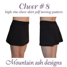 the skirt is black and has white writing on it that says,'cheer 8 high rise