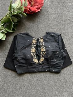 Product Descriptions : Black silk blouse comes with intricate heavy floral motif hand work for back & tikki work all over the blouse as shown View this post on Instagram A post shared by Handcrafted Sarees by Shobana Nithin (@threadslabel_india) Banarasi Blouse