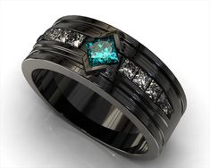 a black ring with blue and white diamonds