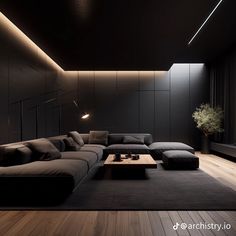 a modern living room with black furniture and wood flooring is lit by recessed lighting