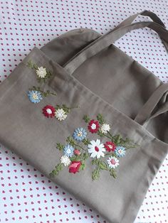 "Hand Embroidered Floral Linen Tote Bag, FLORAL tote bag, Modern Hand Embroidery Tote, Hand stitched Shoulder Groucery Bag, Floral Linen Bag I love doing hand embroidery and, I HOPE YOU'LL LOVE WHAT I HAVE CREATED JUST FOR YOU! ✿  -This tote bag is a one of a kind and perfect for shopping, carrying books/folders, beach stuff -Embrace your vision of coziness and simplicity with this hand-stitched linen tote bag. It's perfect as a gift to your loved ones, for her, or mother's day,  valentines day Modern Hand Embroidery, Linen Tote Bag, Fabric Book Covers, Bags Sewing, Floral Tote Bag, Embroidery Bags, Hand Knit Hat, Flower Bag, Handmade Book