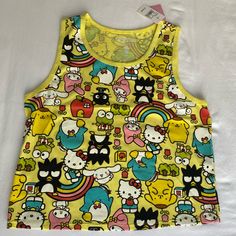 Sanrio Hello Kitty And Friends. Cropped Tank Top. Size 1x New With Tags. Novelty Graphic Tank. Plus Size. Polyester + Spandex Material Keroppi Hello Kitty Tuxedo Sam Pompompurin Chococat Badtz-Maru My Melody #Kidcore #Cartoon #Sanrio Sleeveless Hello Kitty Print Top, Multicolor Cat Print Tops For Summer, Summer Multicolor Cat Print Tops, Kawaii Sleeveless Tops For Spring, Spring Kawaii Sleeveless Tops, Multicolor Cartoon Print Y2k Tops, Multicolor Cat Print Cotton Tops, Kawaii Fitted Sleeveless Top, Fun Multicolor Cartoon Print Tops