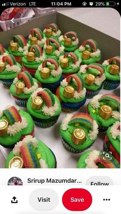 cupcakes with green frosting and gold decorations