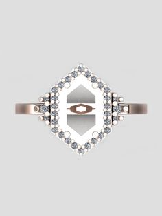 a white diamond ring with two diamonds on the side and an arrow in the middle