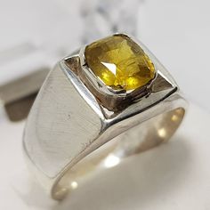 Special Low price offer Guaranteed shipping in 3 Days. ( 5 Woking Days for Delivery Minimum ) Unheated Untreated beautiful Yellow Sapphire pukhraj Handmade Premium 925 Sterling Silver Ring Dark Deep Color yellow Sapphire from Ceylon Sri Lanka Stone Weight is 2.25 Carats Stone Shape is oval cut Ring size 11 US Resize able as per buyer choice great Color and luster mostly transparent FedEx Shipping option I do ship the item in Same working day Contact me in case of any question about the item Pukhraj Ring, Coral Stone Ring, Mens Sapphire Ring, Yellow Sapphire Ring, Yellow Sapphire Rings, Oval Cut Ring, Sapphire Rings, Ceylon Sapphire, Price Offer