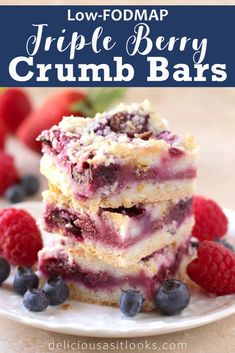 triple berry crumb bars stacked on top of each other