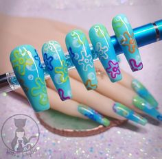 Hand painted acrylic press-on nails. Blue gradient nails with bubbles and flowers painted to mimic the skies in Bikini Bottom from Spongebob. Pictured are Long Coffins, Medium Squares. Package comes with 10 nails, 1 mini nail file, 1 plastic cuticle pusher, 2 alcohol pads, 1 nail oil pen, 1 tube of nail glue, and 1 sheet of adhesive nail stickers. Feel free to message me before ordering for minor changes to colors, design, etc! Physical product may differ slightly, as every set of nails I offer is lovingly handmade. I do my best to capture the best possible color quality in my photos, however, different monitors may slightly distort colors. No refunds. No returns due to hygiene reasons. However, if there is a issue, please contact me and I will work with you, to the best of my ability, to