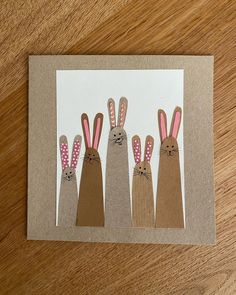 a card with three bunny bunnies on it