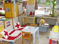 a child's playroom with toys and furniture