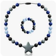 a beaded necklace with a star on it and a black, white and blue bead