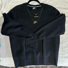 Nwot Nike Crew Neck With Gold Chains Washed Once, Never Worn. Size: Small Color: Black & Gold Casual Black Necklace For Streetwear, Casual Black Chain Necklace, Nike Crew Neck, Nike Sweaters, Nike Sweater, S Crew, Nike Black, Black Nikes, Gold Chains