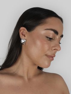 3/4" long x 3/4" wide rounded square dome earring. Tarnish resistant jewelry you don’t have to take off. Continuous wear while maintaining its finish.GOLD: Not to be confused with regular gold plated jewelry– this is a long-lasting, durable layer of rich, 18k gold over high-quality stainless steel. 100% hypoallergenic materials that do not contain nickel or lead. No copper, brass, or any other metals prone to oxidation, so you won't turn green.SILVER: A stunning, highly durable stainless steel w Classic Square Face Jewelry As A Gift, Short Skirts Outfits, Dome Earrings, Silver Shorts, Gold Shorts, Rounded Square, Bodysuit Fashion, Earring Sale, Plated Jewelry