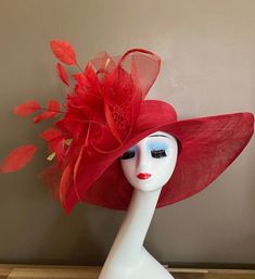 Wide brim sinamay hat with large bow and feather flower, elegant, light and comfortable to wear. Perfect for weddings, Royal Ascot horse races, cocktails, tea party, derby, or any hat wearing occasion. Head size is about 22.5" unless otherwise requested. All hats include a sizing band to adjust for a comfortable fit.  Warm tips:  ❤️Group discount on 3 or more pieces, please contact me for further information on group discount. ❤️Due to the nature of my items, I do not accept returns, but contact me if there's problem with your order Key Features: Wide brim Appr: 6" Head Grith Appr: 22.5" and adjustable to fit sizes smaller than 22.5" Crown Deep Appr: 4.5" Processing Time: 1-3 business days Summer Evening Hats With Feather Trim, Wide Brim Feather Trim Fascinator For Kentucky Derby, Kentucky Derby Wide Brim Fascinator With Feather Trim, Red Summer Hats For Garden Party, Summer Party Hat With Feather Trim, Summer Formal Hats With Feather Trim, Red Curved Brim Fascinator For Garden Party, Formal Summer Hats With Feathers, Royal Ascot Wide Brim Fascinator With Feather Trim