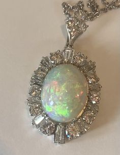 Vintage 14k white gold 5.17ct opal, 2.26ct white diamonds Circa 1950s, estate 16" chain In store now and available to ship within 1-2 business days Opal Necklaces, Jemma Wynne, Bridal Beauty, Australian Opal, Opal Necklace, White Diamonds, Earring Necklace, Diamond Pendant, Ring Necklace