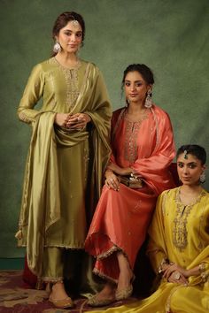 Sage green kurta with zardozi, sequin embroidery on neckline, sleeves and buttis spread all over in leaf stripe pattern. Paired with border embroidered pant and dupatta. - Aza Fashions Green Unstitched Raw Silk Suit With Mirror Work, Festive Pista Green Chinon Kurta, Green Slub Silk Dupatta With Mirror Work, Green Dola Silk Kurta For Party, Green Unstitched Suit With Mirror Work For Festive Occasions, Festive Green Unstitched Suit With Mirror Work, Green Mirror Work Dupatta, Pista Green Dori Work Kurta In Dola Silk, Green Dola Silk Kurta With Dori Work