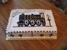 a birthday cake with a train on it