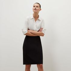 Machine-washable, wrinkle-resistant, and breathable, this pencil skirt folds up into a compact shape—and looks polished... Modern Workwear Mini Pencil Skirt, Versatile Flowy Skirt For Work, Modern Pencil Mini Skirt For Workwear, Modern Pencil Mini Skirt For Work, Classic Relaxed Mini Skirt For Office, Classic Flowy Skirt For Office, Versatile Workwear Pencil Skirt, Versatile Pencil Skirt For Work, Relaxed Lined Skirt For Workwear