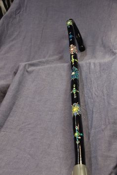 A unique hand painted masala design using Acrylic paint and finished with Yacht varnish Unique Walking Sticks, Custom Canes, Pinewood Derby, Kids Wooden Toys, Painted Sticks