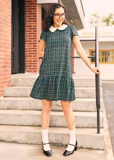 Channel your younger self with the School Days Collared Dress from our ModCloth namesake label, where comfort meets playful nostalgia. Crafted from a soft knit fabric, with a loose fit and cap sleeves, this dress is a dream to wear. Featuring a classic contrast collar, ruffle hem detail, and zipper closure, it's perfect for pairing with ankle socks and loafers. This versatile piece promises to be your go-to for fall.Machine wash cold, line dryLength 36"ImportedShell: 95% Polyester, 5%Elastane Contrast: 100% CottonModel is wearing a US size SModel Measurements: Height 5'5"/Bust 34"/Waist 24"/Hips 36" Retro Dresses For Women, Collard Dress, Dude Clothes, Younger Self, Outfits Unique, Day Collar, Retro Fashion Women, Collared Dress, Contrast Collar