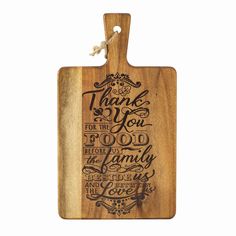 a wooden cutting board with the words thank you for the food and family on it