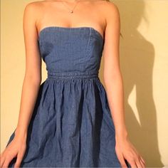 Denim Strapless Mini Dress By Free People! Never Worn! Strapless Cotton Mini Dress In Medium Wash, Strapless Medium Wash Cotton Mini Dress, Dark Wash Strapless Mini Dress For Summer, Casual Blue Strapless Denim Dress, Dark Wash Strapless Dress For Summer, Medium Wash Strapless Mini Dress For Spring, Spring Strapless Mini Dress In Medium Wash, Spring Strapless Medium Wash Mini Dress, Strapless Medium Wash Cotton Denim Dress