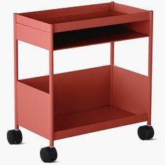 a red cart with two wheels and one shelf on the bottom is shown in front of a white background