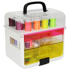 an organized craft box filled with lots of different colored spools