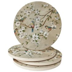 three plates with birds and flowers on them