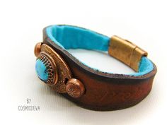 Beautiful one of a kind handcrafted southwestern leather bracelet made of earthy mid-western style brown dyed veg tan leather. The focal point is a natural stabilized Tibet turquoise with a bezel setting in solid copper. Earthy Brown, Leather Cuff Bracelet, Bronze Jewelry, Veg Tan Leather, Southwest Style, Leather Cuffs Bracelet, Southwestern Style, Copper Pendants, Leather Cuffs