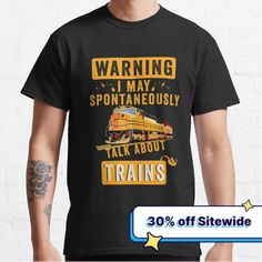 a man wearing a black t - shirt with the words warning i may spontaneously talk about trains on it