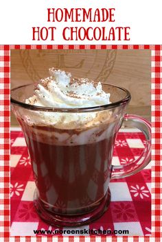 homemade hot chocolate in a glass mug with whipped cream on top and text overlay that reads homemade hot chocolate