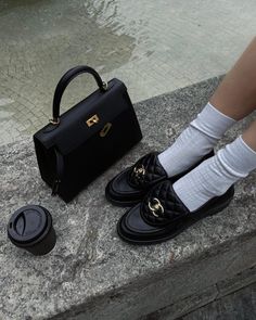 If you're looking for a pair of chic women's shoes, why not invest in a pair of designer loafers that will elevate SO many of your looks? We love these trendy black Chanel loafers for example, styled here with a black Hermes Kelly bag and preppy white socks. Ski Outfits, Chanel Loafers, Pernille Teisbaek, Loafers Outfit, Shoe Wardrobe