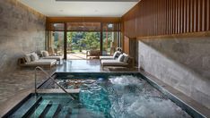 an indoor hot tub in the middle of a room