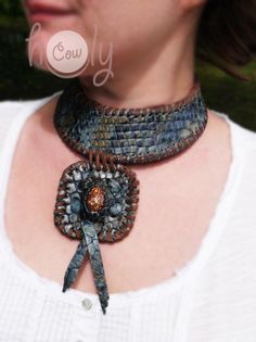 This beautiful handmade leather necklace is made from the finest quality blue snake print leather. It has beautiful sea shell incorporated into it's design. This medieval necklace is adjustable at the back so it fits all sizes. Handmade Leather Choker Necklace, Blue Leather Jewelry For Festivals, Handmade Leather Festival Necklaces, Handmade Leather Necklaces For Festivals, Handmade Leather Necklace For Festivals, Handmade Bohemian Snake Necklace, Artisan Blue Leather Jewelry, Handmade Leather Necklaces, Medieval Necklace