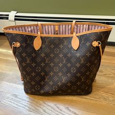 **Lv Dust Bag Included** Rare & Discontinued 2016 Louis Vuitton Monogram Neverfull Mm With Rose Ballerine Interior. Canvas Is In Excellent Condition. Leather Has An Even Moderate Honey Patina. Interior Overall Is In Good Condition But Does Have Some Water Marks/Staining As Shown In The Photos. No Rips/Tears Or Odors. Made In Spain. Date Code Is Gi 0176 Will Include A Brand New Light Pink Base Shaper/Organizer As A Free Gift! Brown Monogram Shoulder Bag For Shopping, Brown Monogram Print Bag For Daily Use, Travel Tote Bag With Monogram Print, Luxury Bag With Monogram Print And Double Handle, Designer Everyday Bags With Monogram Print, Designer Bags With Monogram Print For Everyday Use, Brown Monogram Print Bag For Shopping, Monogram Print Canvas Bag For Shopping, Designer Monogram Print Shoulder Bag For Shopping