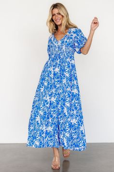 Elaine Maxi Dress | Blue + White V-neck Maxi Dress With Smocked Back For Vacation, Summer V-neck Maxi Dress With Elastic Waistband, V-neck Beach Dress With Elastic Waistband, White V-neck Maxi Dress With Smocked Back, Empire Waist Floral Print Maxi Dress For Beach, Vacation V-neck Maxi Dress With Smocked Back, Summer Maxi Dress With Elastic Waistband And V-neck, Summer Maxi Dress With V-neck And Elastic Waistband, V-neck Dress With Elastic Waistband For Vacation