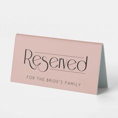 a pink business card that says reserved for the bride's family