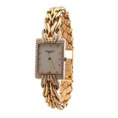 Patek Philippe La Flamme Gold Diamond Ladies Quartz Watch 4835/3. Watch is in great preowned condition, set on a original 18k gold bracelet. Weighs 93 grams. BRAND: Patek Philippe MODEL: La Flamme REF: 4835/3 CASE SIZE: Case 21mm x 29mm CASE MATERIAL: 18k Yellow Gold FUNCTIONS: Hours, Minutes CONDITION: ﻿Preowned, excellent condition BOX : No PAPERS : ﻿No Luxury Coach Watch For Formal Occasions, Luxury Cartier Yellow Gold Diamond Watch, Women Patek Philippe, Luxury Cartier Yellow Gold Watch, Luxury Vintage Yellow Gold Watch, Patek Phillipe Women, Phillip Patek Watches, Vintage Patek Philippe, Patek Philippe Women