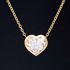 This reclaimed heart shape diamond, now set in this chunky yellow gold bezel is only the most charming pendant ever! The diamond is a spready "fat" heart, with delicious broad facets. Beyond charming, sitting nice and low on the neck. 18kt yellow gold Chain measures 18" Diamond is estimated to be O/P color & VS2 clarity. GIA Standards Please see qualitative report for more information. Yellow Gold Heart-shaped Rose Cut Diamond Jewelry, Yellow Gold Heart-shaped Jewelry With Rose Cut Diamonds, Gold Heart-shaped Rose Cut Diamond Jewelry, Gold Heart Shaped Jewelry With Rose Cut Diamonds, Gold Heart Necklace With Single Cut Diamonds, Gold Heart-shaped Diamond Necklace With Single Diamond, Modern Mens Rings, Art Jewelry Earrings, Antique Watches