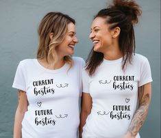 two women wearing white t - shirts with the words current besties and future besties printed on them