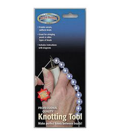 the knotting tool is made with pearls and plastic beads, which are used to make bracelets