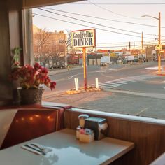 an empty restaurant with a sign that says goodbye diner